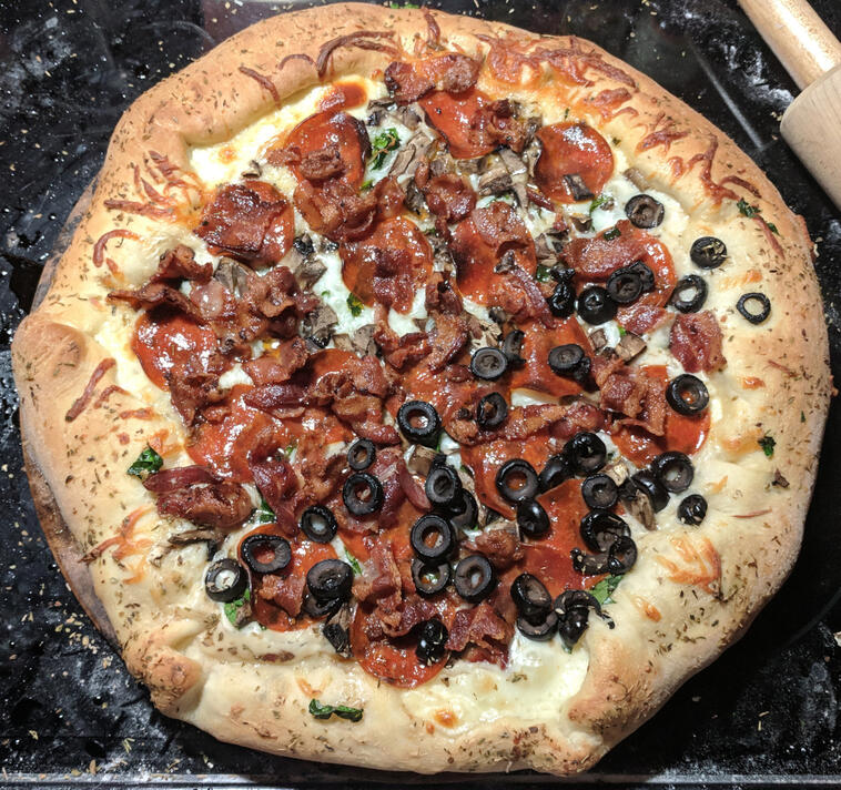 stuffed crust mushroom, pepperoni, and half black olive pizza